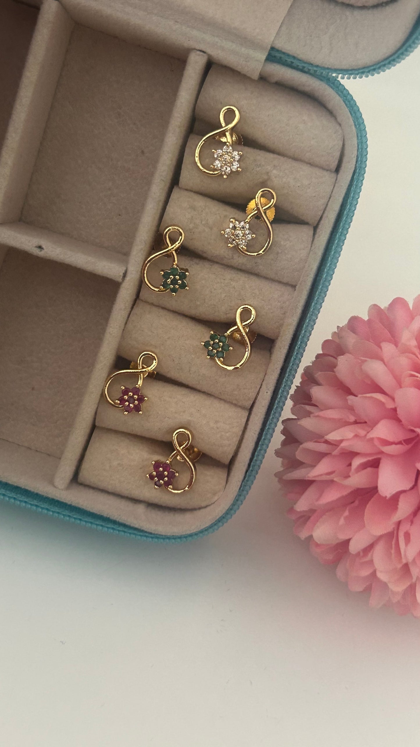 Curved  flower screwback studs in colours