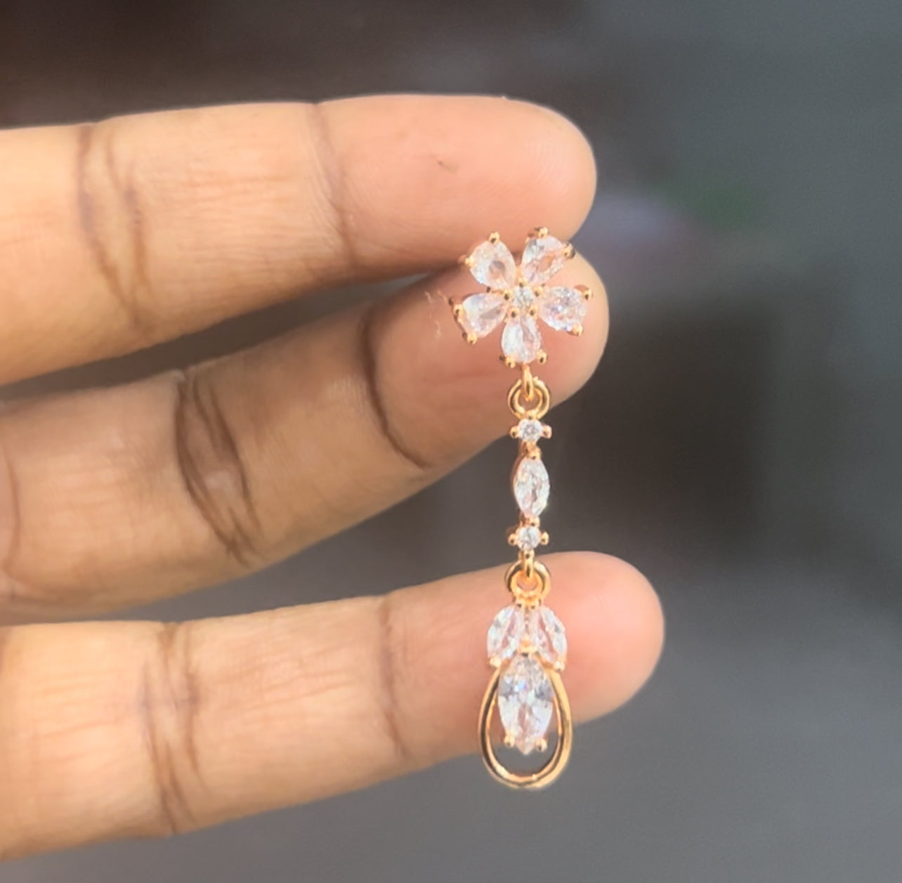 CZ flower stud with long stone hanging