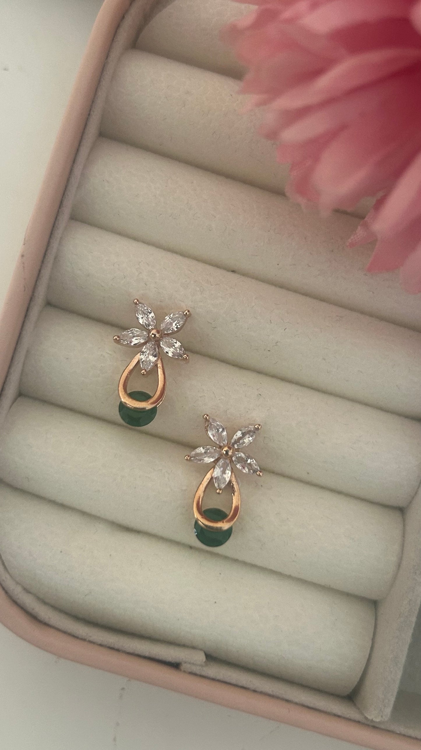 CZ white flower stud with green stone