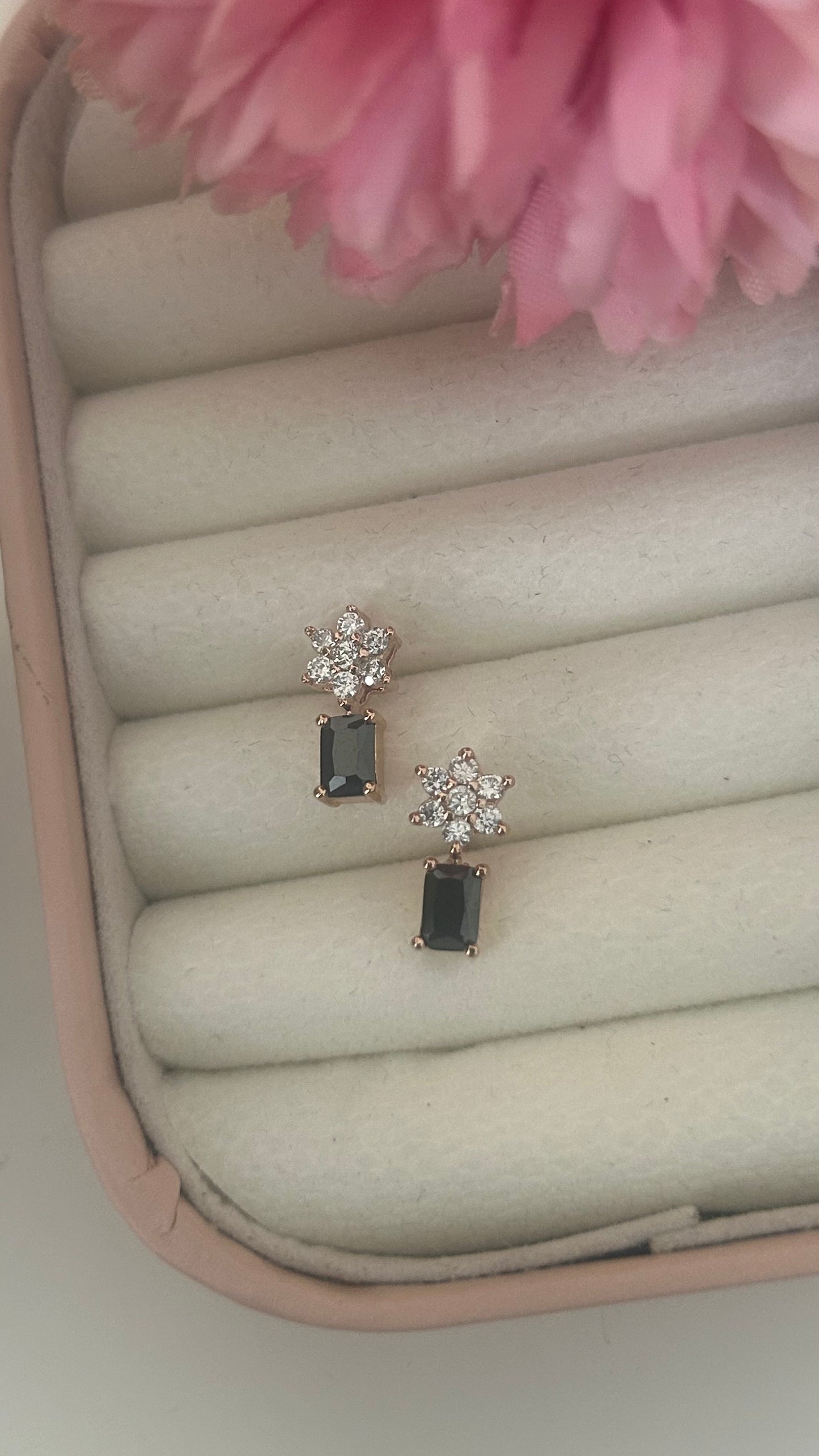 CZ white flower stud with black stone