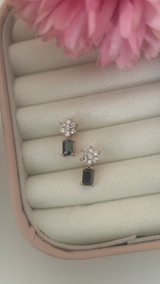 CZ white flower stud with black stone