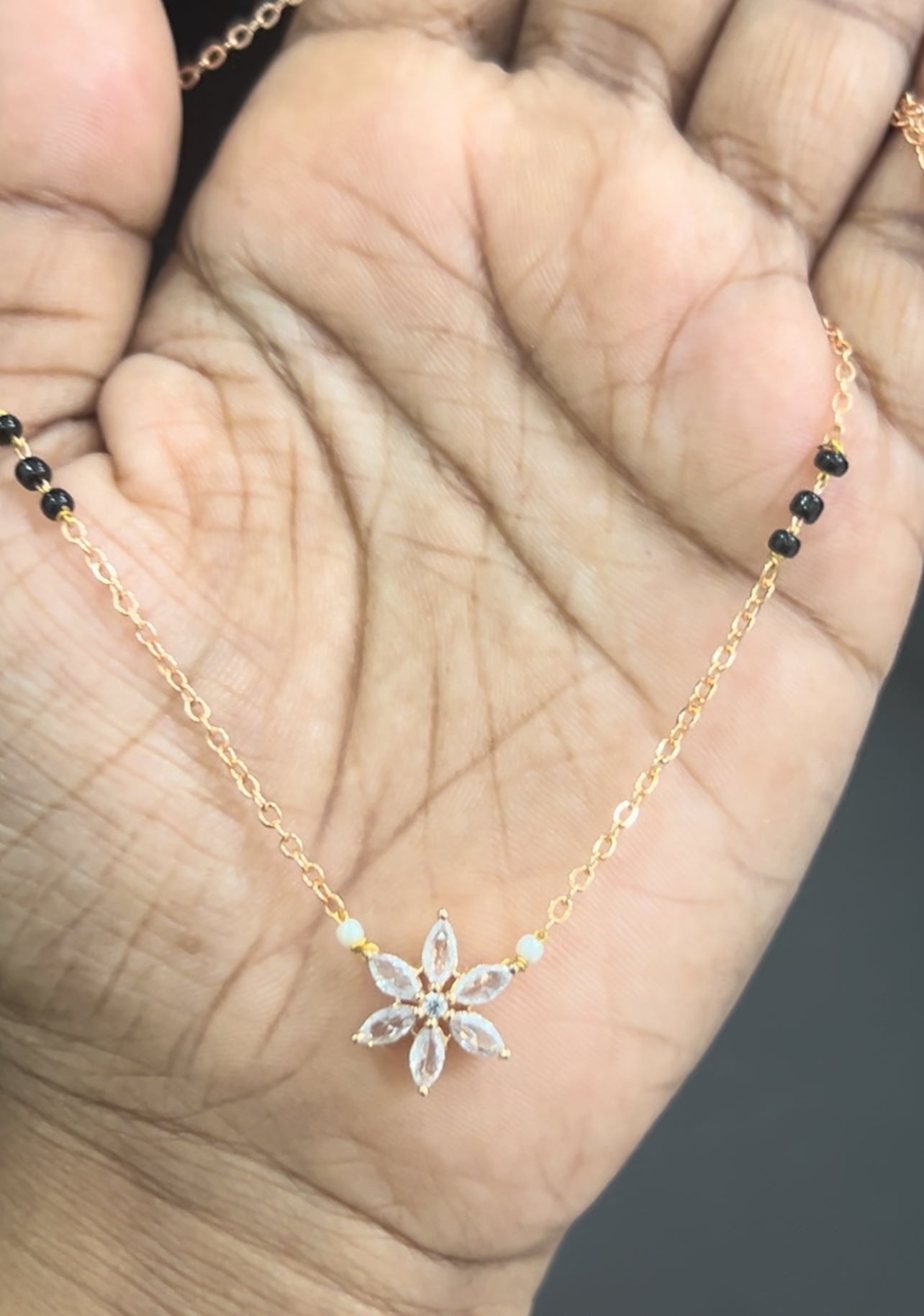 CZ black beads with white flower