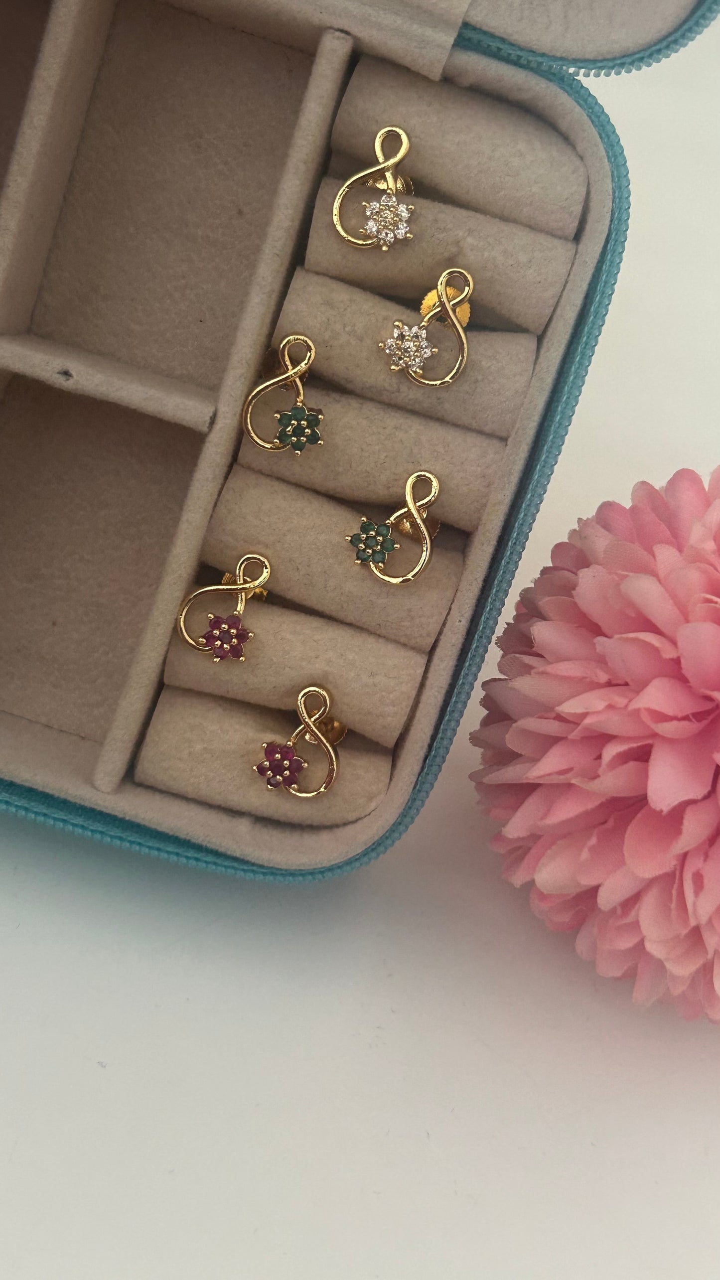 Curved  flower screwback studs in colours