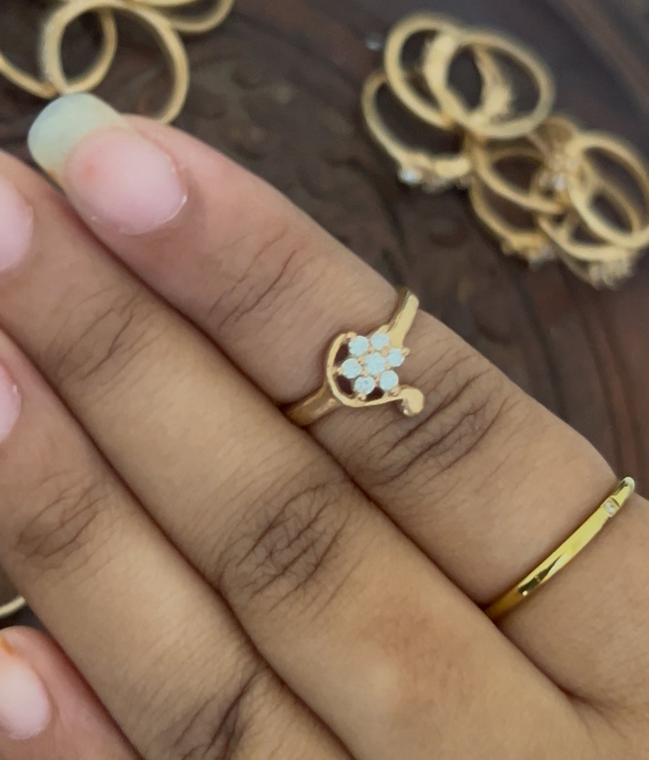 Radiant Bloom Panchaloha Ring – With Dangling Floral Accent