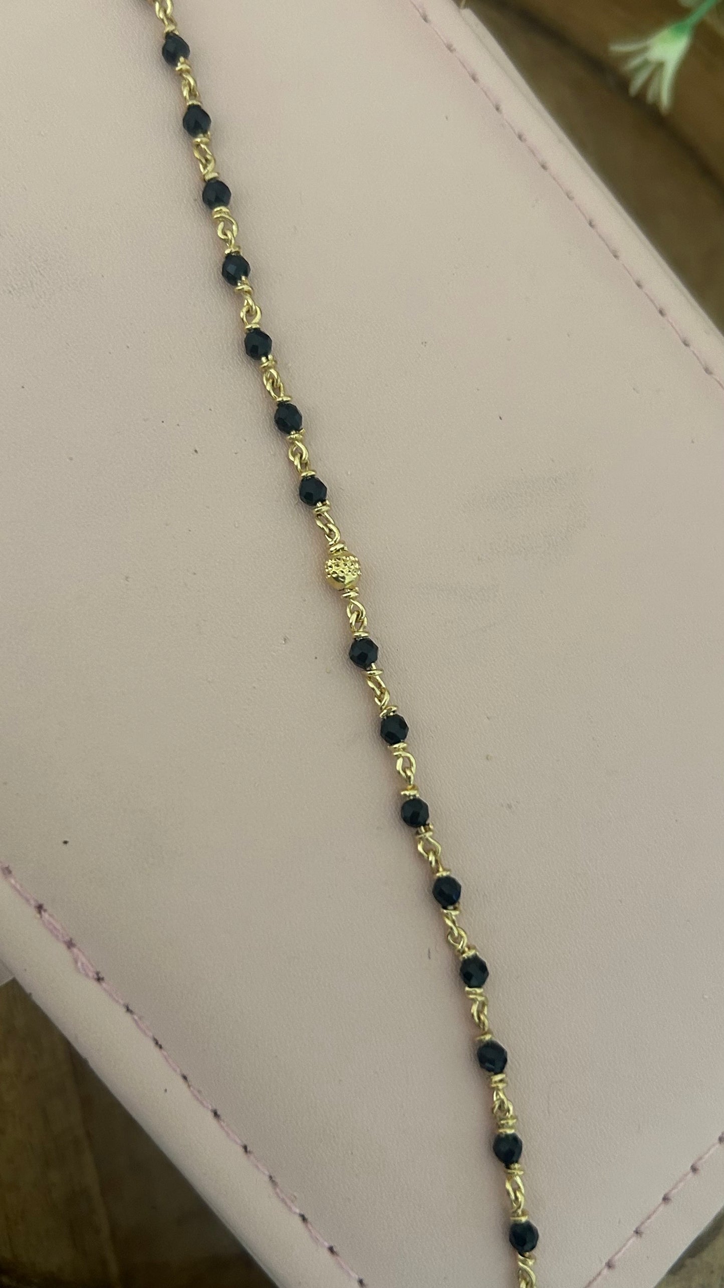 "Panchaloham Black Beads Bracelet (Unpolished) –  24, 26 & 28, bangles  sizes it fits comfortably for these measurements."