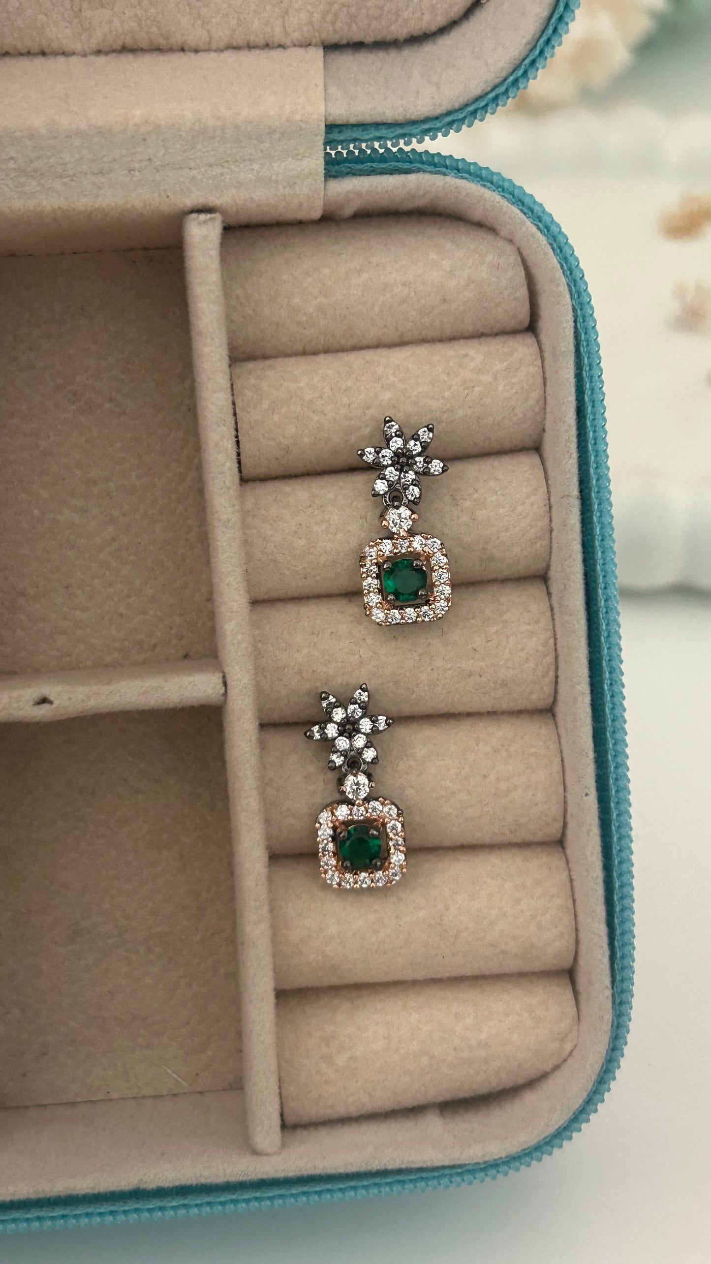 CZ flower stud with green stone