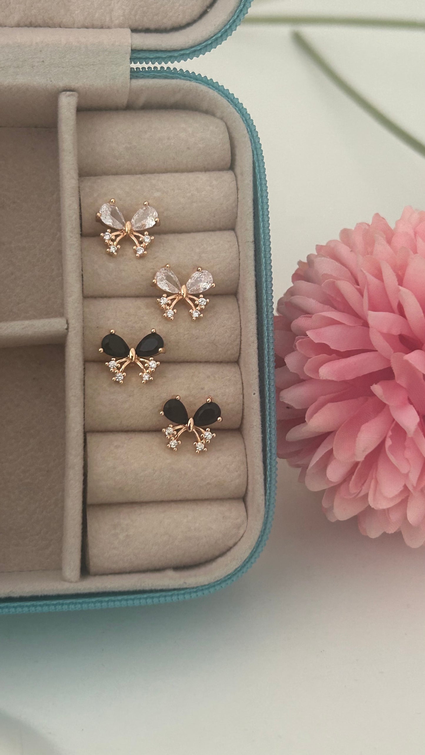 Elegant Rose Gold Bow Earrings with Shimmering Diamonds