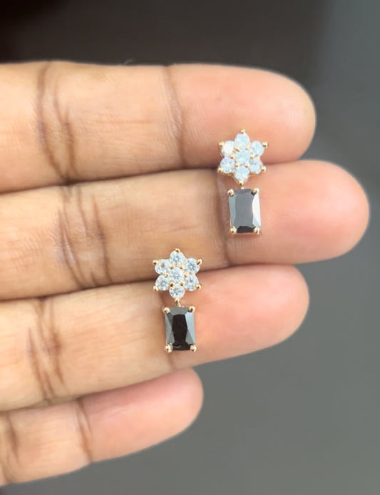 CZ white flower stud with black stone