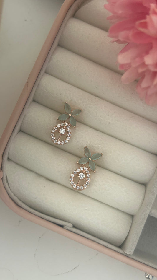 CZ 4 petal earring with oval shape drop