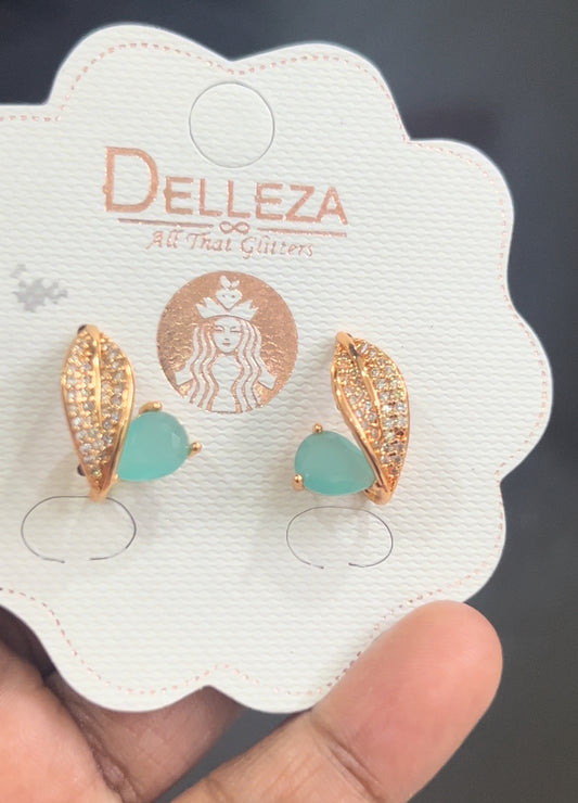 CZ seablue curved stud with leaf pattern