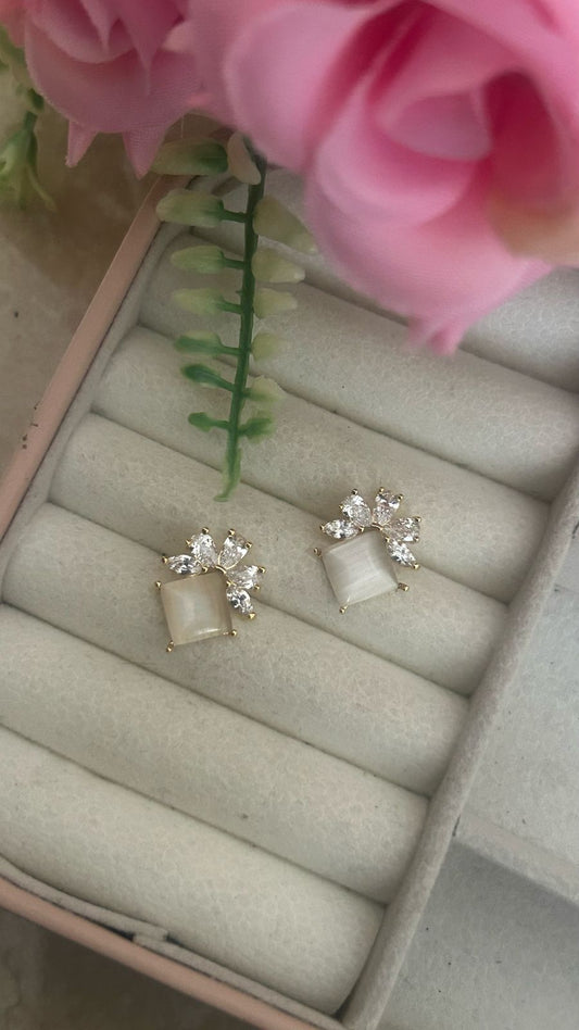 Ivory Blossom Studs – Elegant Pearl White Stone Earrings with Crystal Petals