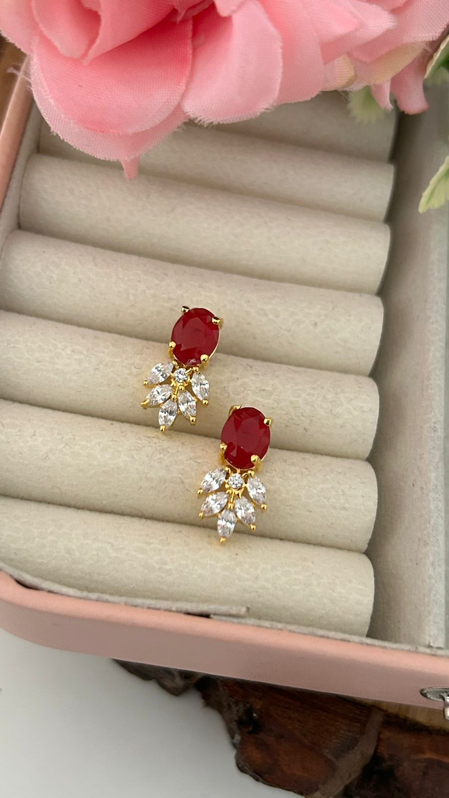Ruby Red Oval Stone Stud Earrings with CZ Leaf Drops – Gold Finish