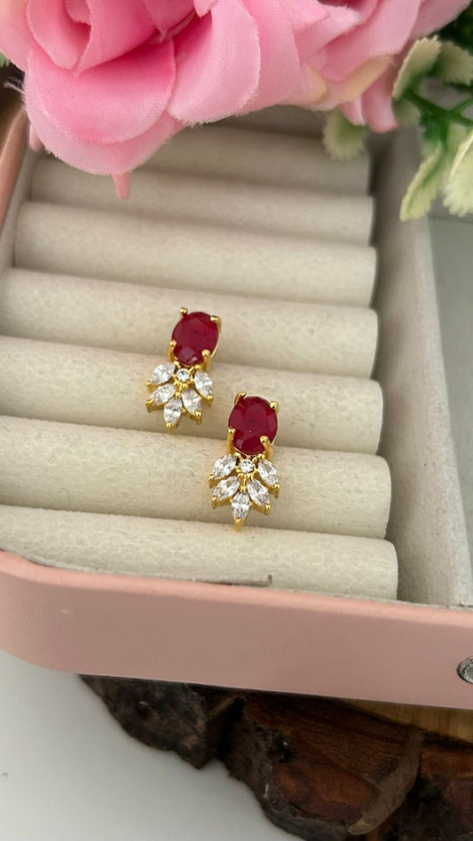 Ruby Red Oval Stone Stud Earrings with CZ Leaf Drops – Gold Finish