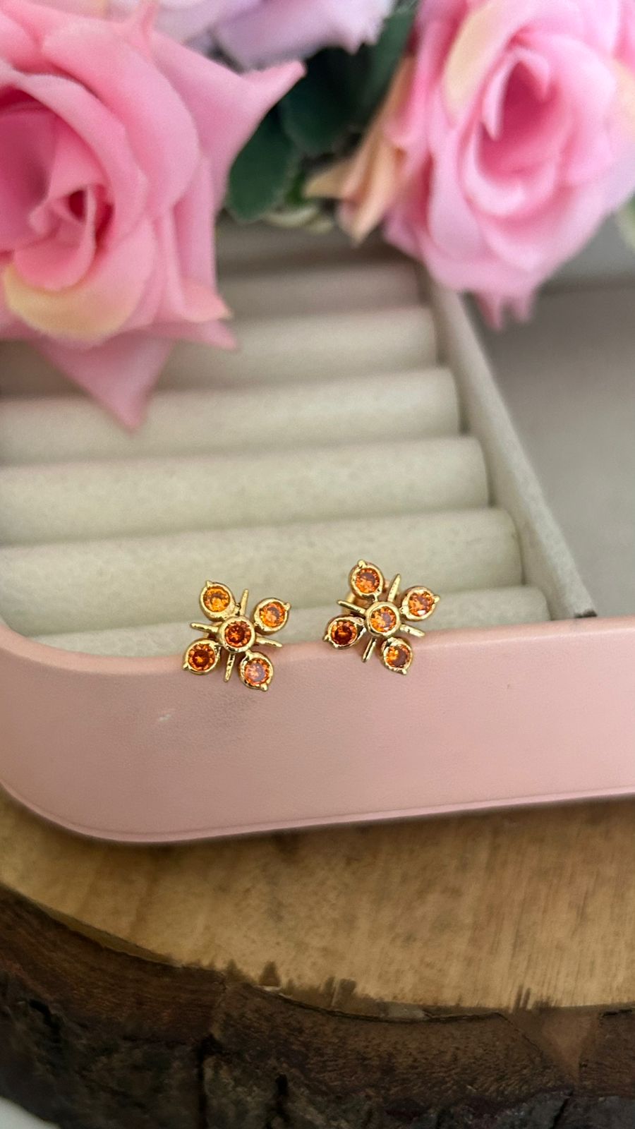 Elegant Panchaloham Stud Earrings with Crystal Accents in orange in medium size