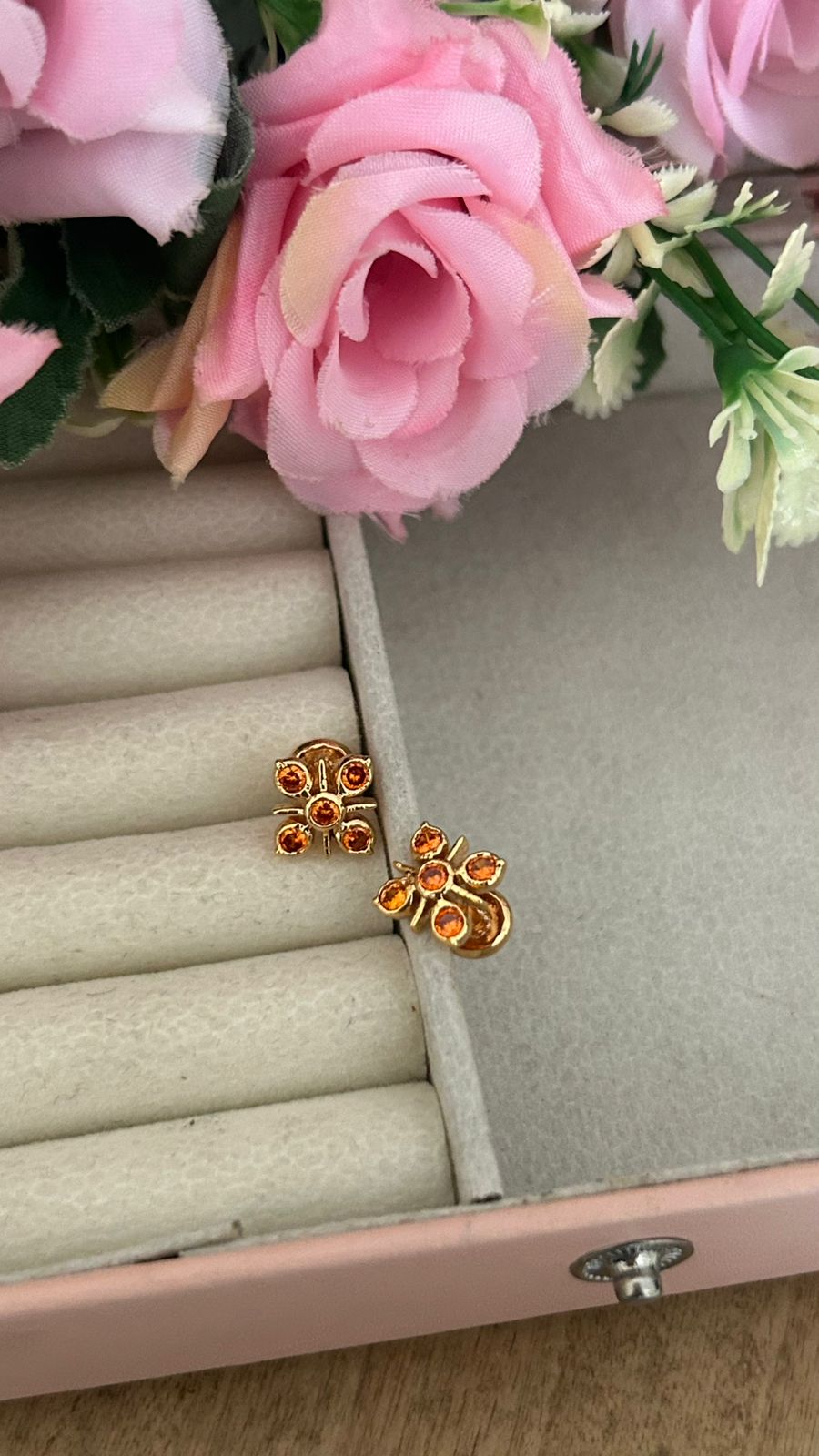 Elegant Panchaloham Stud Earrings with Crystal Accents in orange in medium size