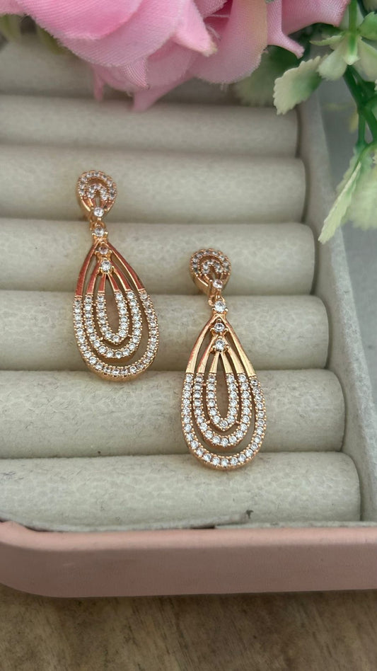 Designer CZ Drop Earrings with Layered Teardrop Design –