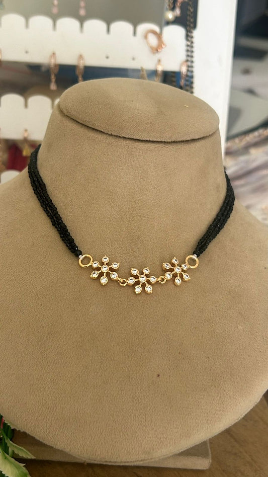 Black Beads Mangalsutra Necklace Panchaloham Polished Floral Pendant Design Elegant Traditional Jewelry for &Festive Wear