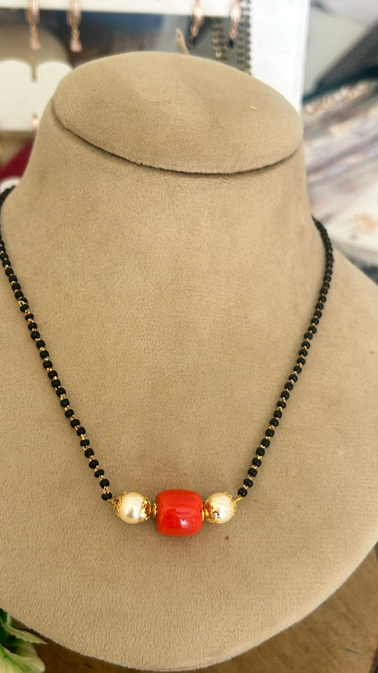 Elegant Black Beads Chain with Coral Center Bead and Swarovski Pearls