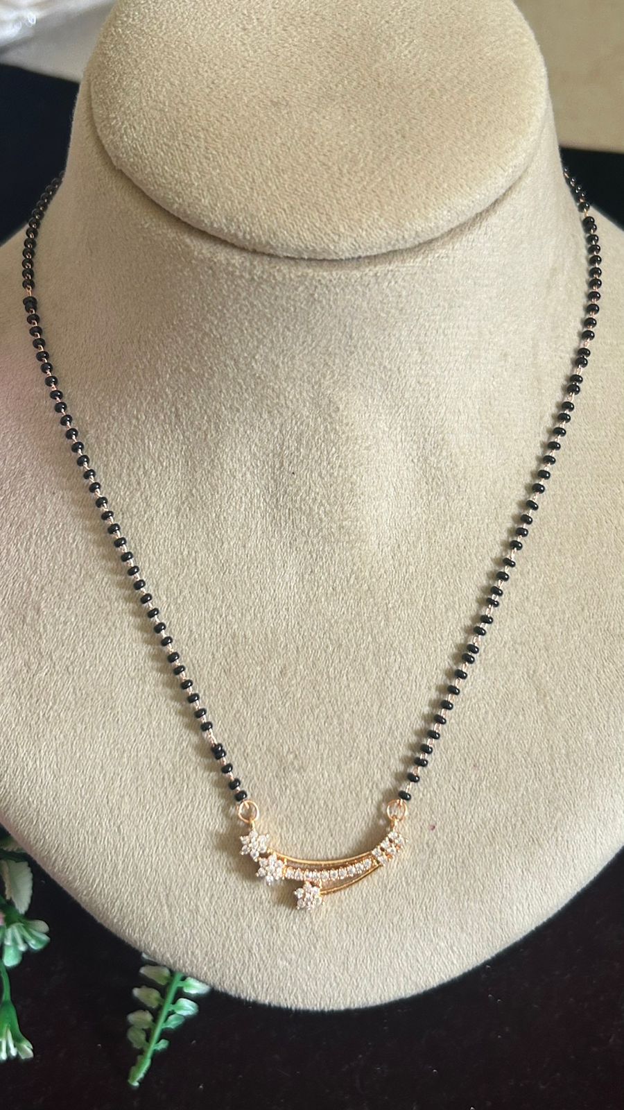 Rose Gold Finish Black Beads Mangalsutra with Curved CZ Floral Pendant