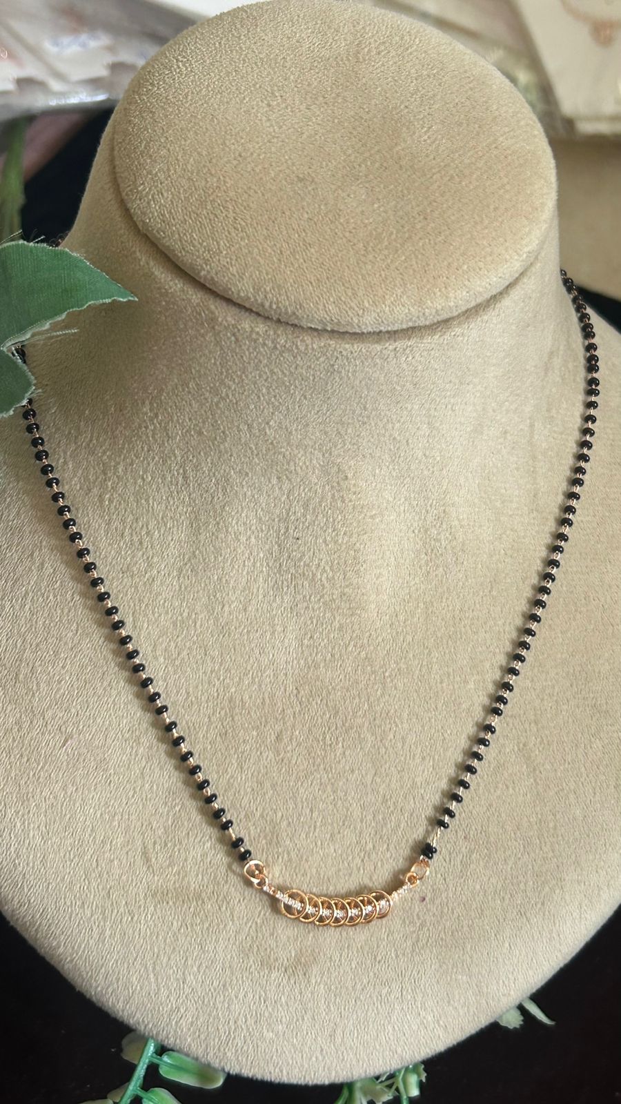 Elegant Rose Gold Black Beads Mangalsutra with Circle Loop Crystal Design