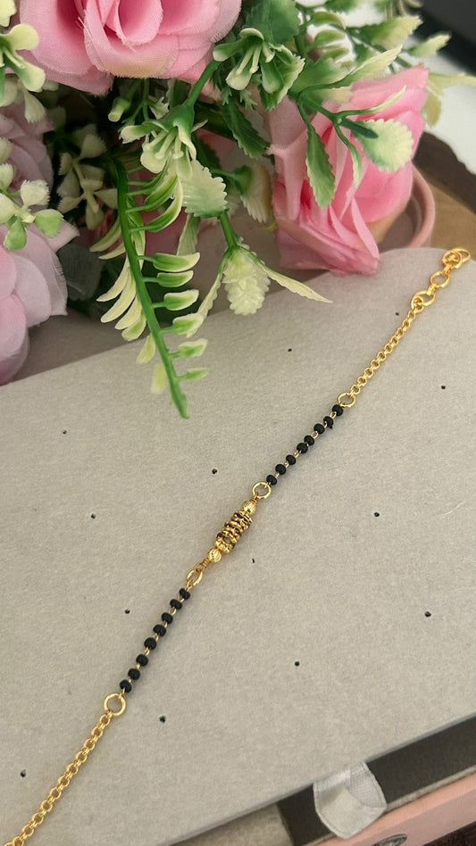 Traditional One Gram Gold Plated Black Beads Bracelet with Designer Gold Center | Women's Mangalsutra Bracelet