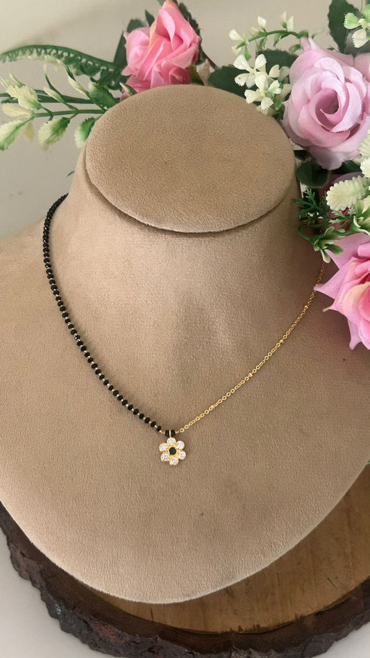 Gold Plated Black Beads Mangalsutra with Crystal Flower Pendant – Lightweight Daily Wear Design