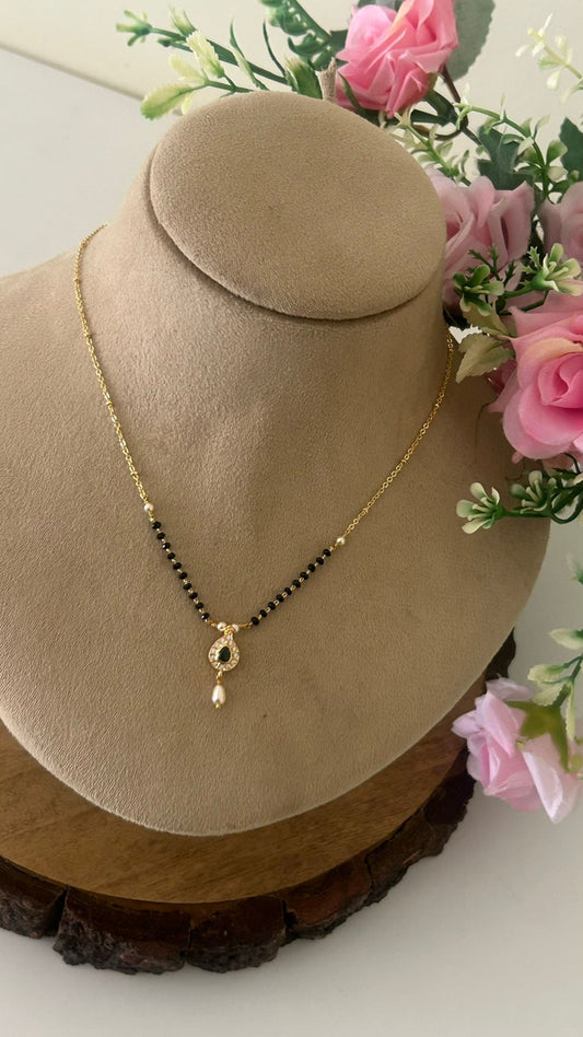 Elegant Black Beads Mangalsutra with Green Stone Pendant and Pearl Drop