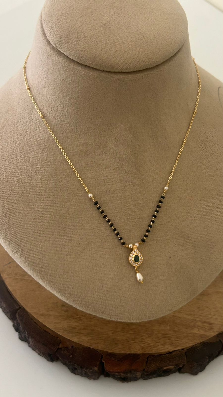 Elegant Black Beads Mangalsutra with Green Stone Pendant and Pearl Drop