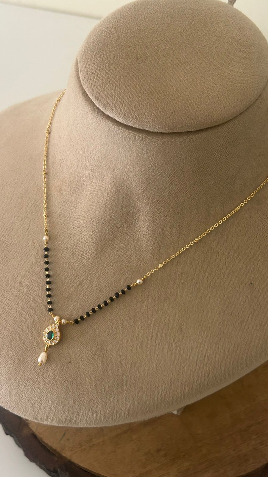 Elegant Black Beads Mangalsutra with Green Stone Pendant and Pearl Drop