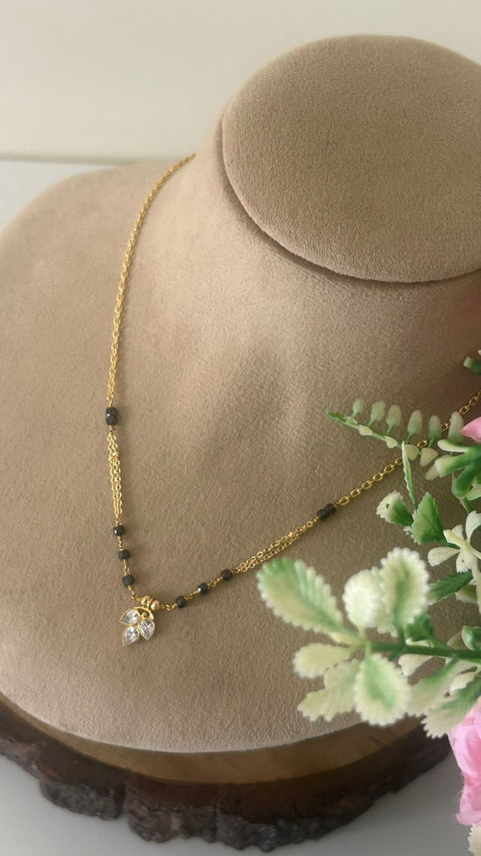 Designer Black Beads Mangalsutra with Polki Pendant and Side Chain Detailing