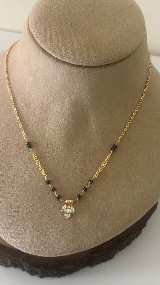 Designer Black Beads Mangalsutra with Polki Pendant and Side Chain Detailing