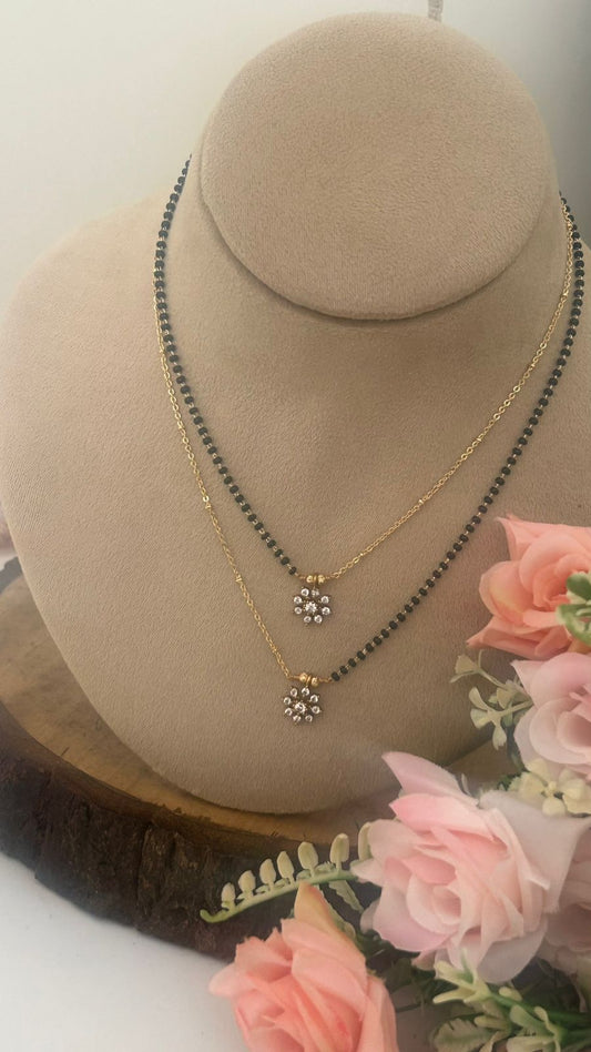 Modern Fusion Black Beads Necklace with Floral Pendant
