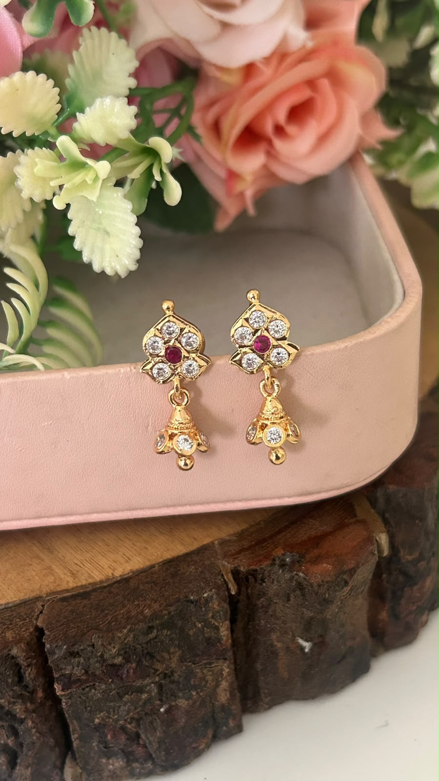 Ruby Center Panchaloham Jhumka Earrings with polish