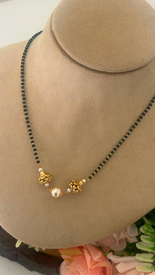 Black Beads Mangalsutra Chain with Pearl & Leaf Charm Design