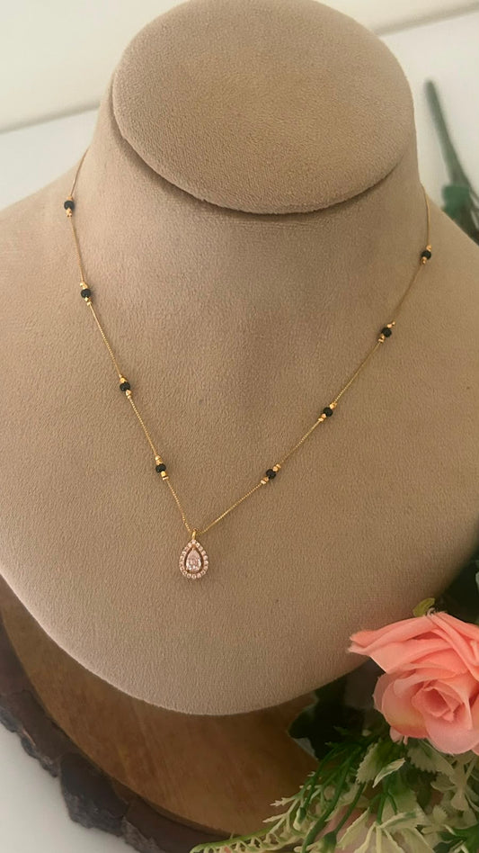 Elegant Gold-Finish Black Beads Mangalsutra Chain with Teardrop CZ Pendant
