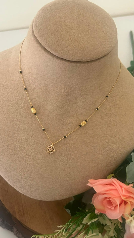 Black Beads Mangalsutra Chain with Floral CZ Pendant and Textured Gold Beads