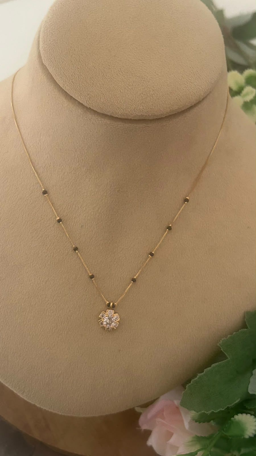 Radiant Blossom CZ Pendant Black Beads Mangalsutra Chain with Gold Finish