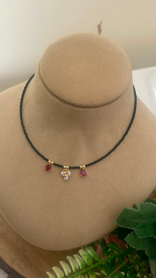 Black Beads Ruby & polki Pendant Invisible Chain Necklace | 14–15 Inches