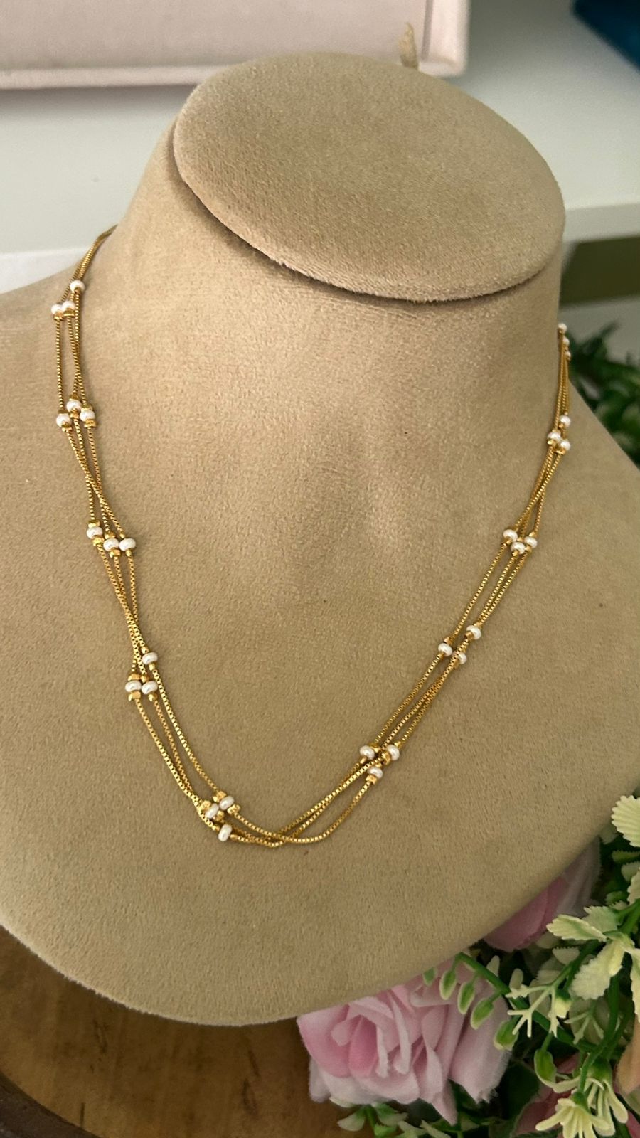 Elegant Triple Strand Gold Necklace with White Micro Bead Stations