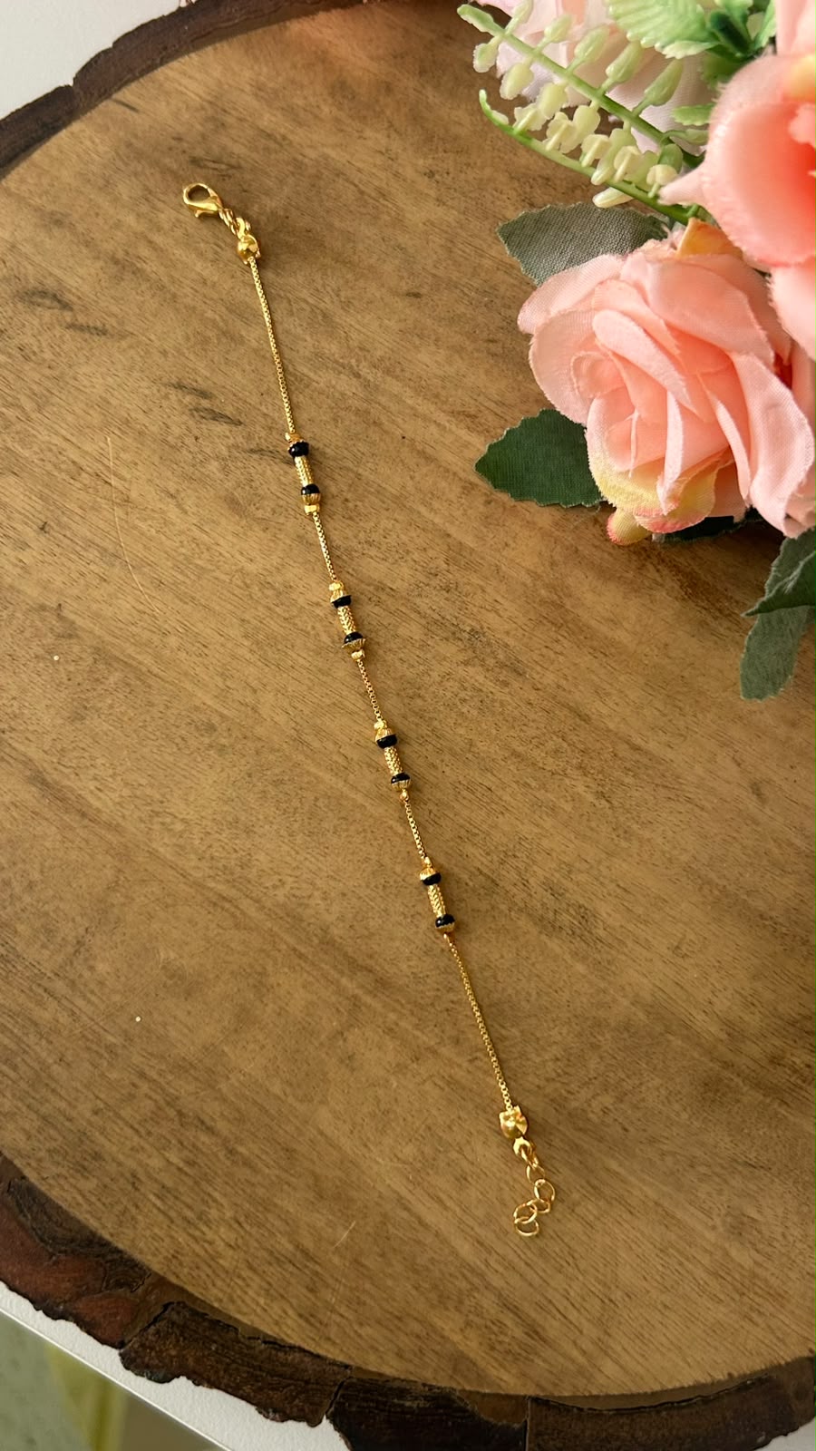 Minimalist Black Beads Nazariya Bracelet with Textured Gold Drums