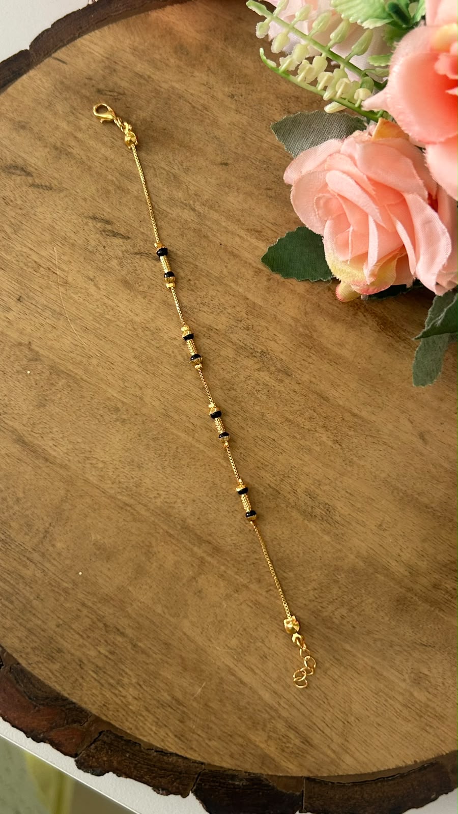 Minimalist Black Beads Nazariya Bracelet with Textured Gold Drums