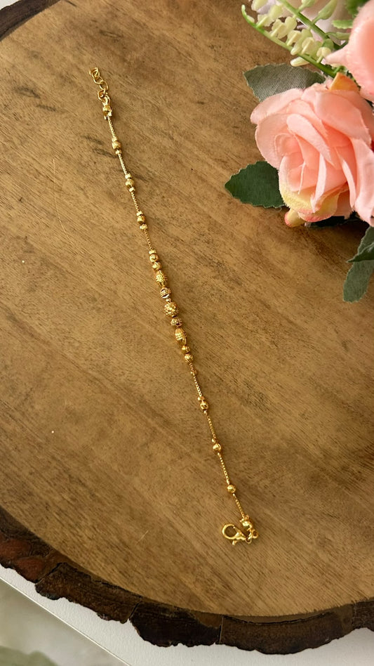 Minimalist All Gold Polished Bracelet with Intricate Textured Charms