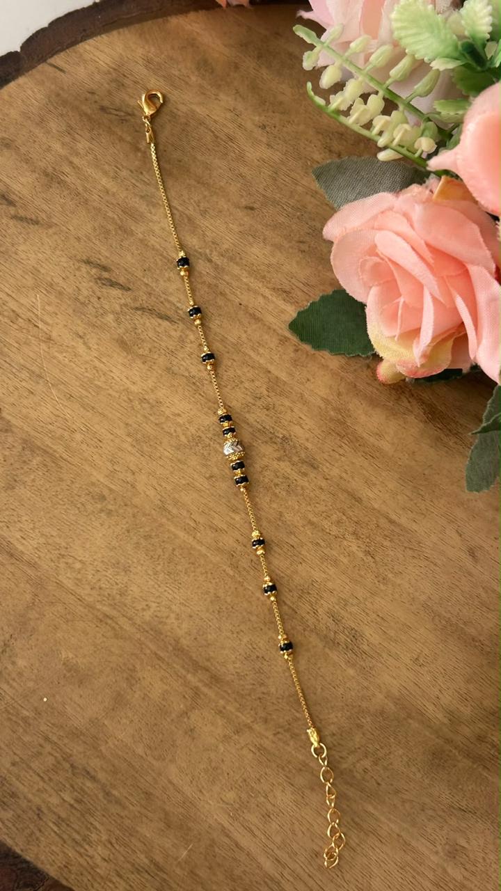 Minimalist Black Beads Nazariya Bracelet with Textured Central Bead