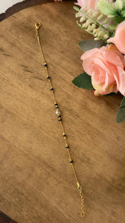 Minimalist Black Beads Nazariya Bracelet with Textured Central Bead