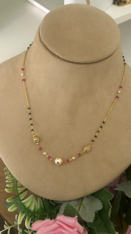 • Modern Minimalist Black Beads Short Mangalsutra with Pearl and Ruby Charms