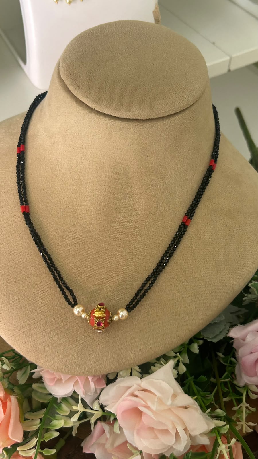 Designer Double Line Black Beads Mangalsutra with Red & Gold-Tone Traditional Pendant and Pearl Accents for Women