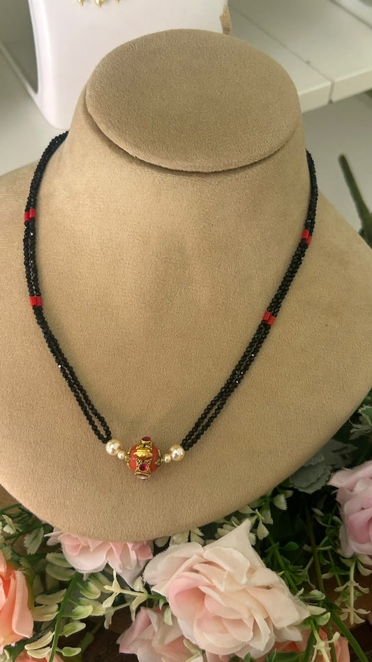 Designer Double Line Black Beads Mangalsutra with Red & Gold-Tone Traditional Pendant and Pearl Accents for Women