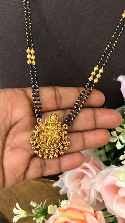Traditional Lakshmi Devi Pendant Double Line Black Beads Mangalsutra with Antique Gold Finish – 20 to 22 Inches
