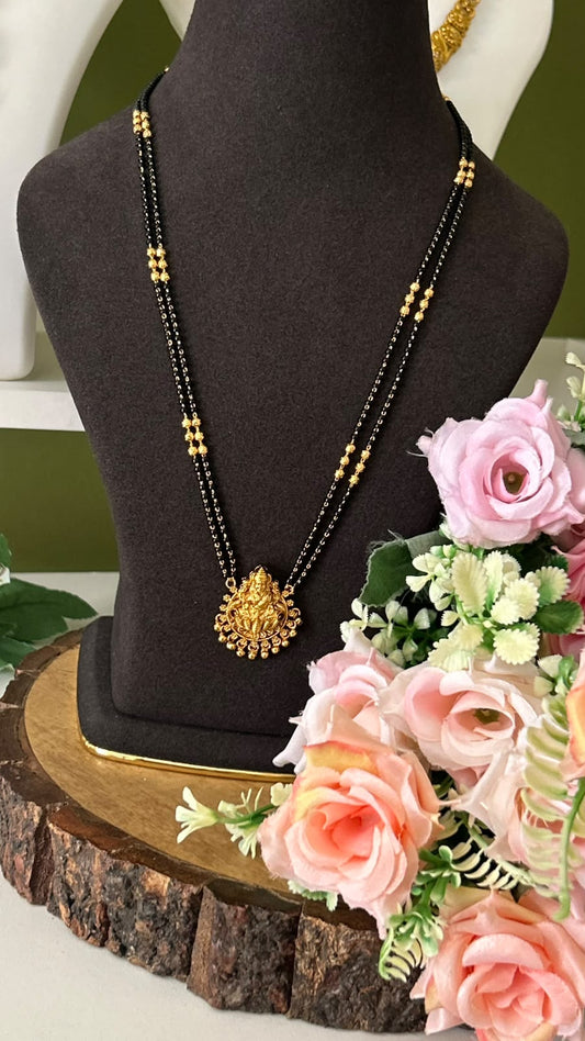 Traditional Lakshmi Devi Pendant Double Line Black Beads Mangalsutra with Antique Gold Finish – 20 to 22 Inches