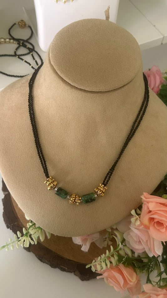 Elegant Double Line Black Beads Mangalsutra Necklace with Green Stone Beads & Antique Gold Floral Accents for Women